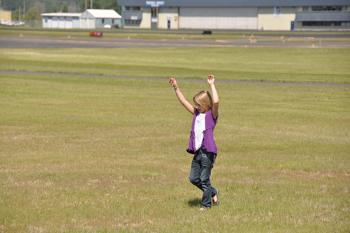 Jumping for joy that our flight attendant is finally ready - from the Flying to Florence May 2012 photo gallery.