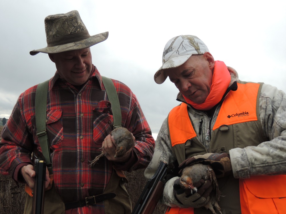 Michael and Rodney with a pair of Hungarian partridges - from the Hungarian Partridge and Pheasants - Double Barrel Ranch photo gallery.