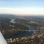 Over Oregon City, downtown Portland in the distance