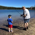 Pops teaching Ben to fish